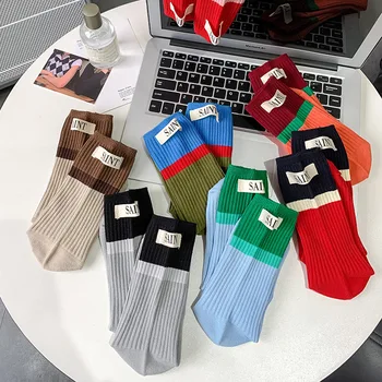 Meias de algodão feminino ins tendência Coreia do Sul Dongdaemun meias colisão cor de retalhos de pano rótulo de pilha pilha de meias meias coloridas